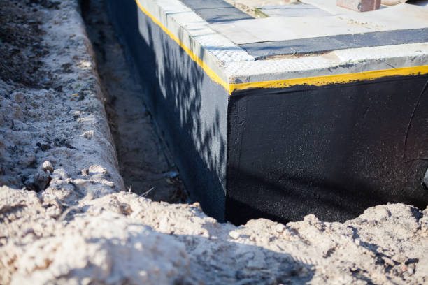 Professional Waterproofing technician working in Pimento, IN
